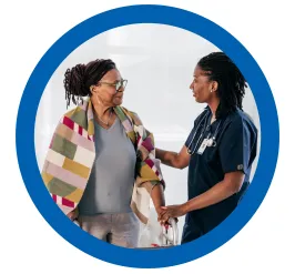 health professional talking to a senior citizen